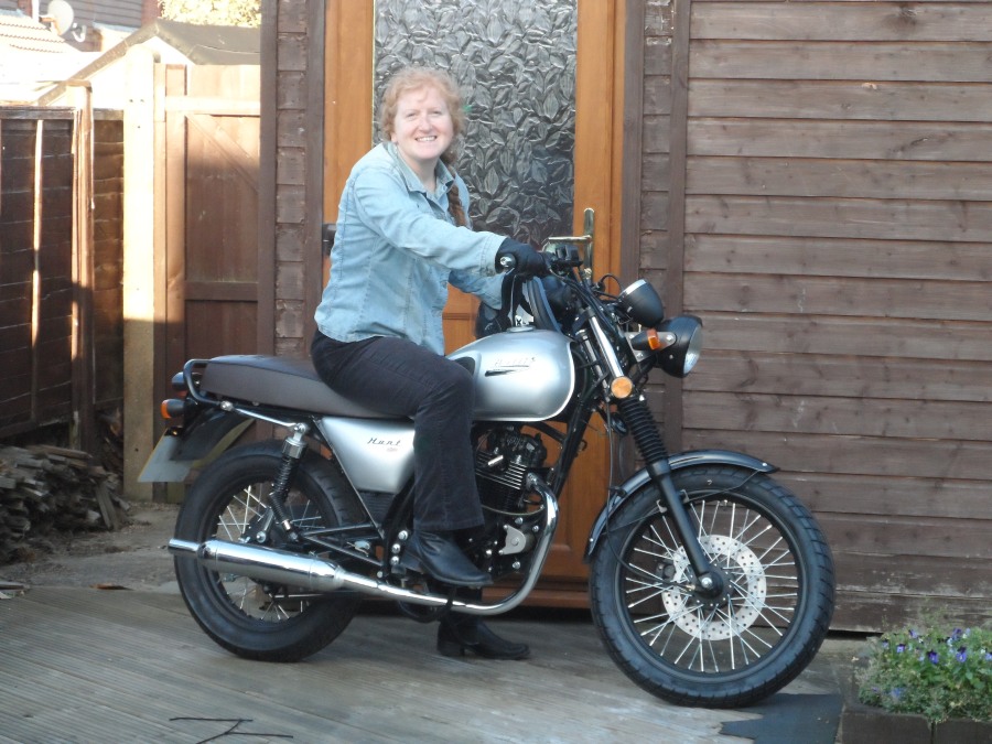Kay on Bullit Hunt motorbike (don't worry - I wear a helmet when I'm actually riding it!)